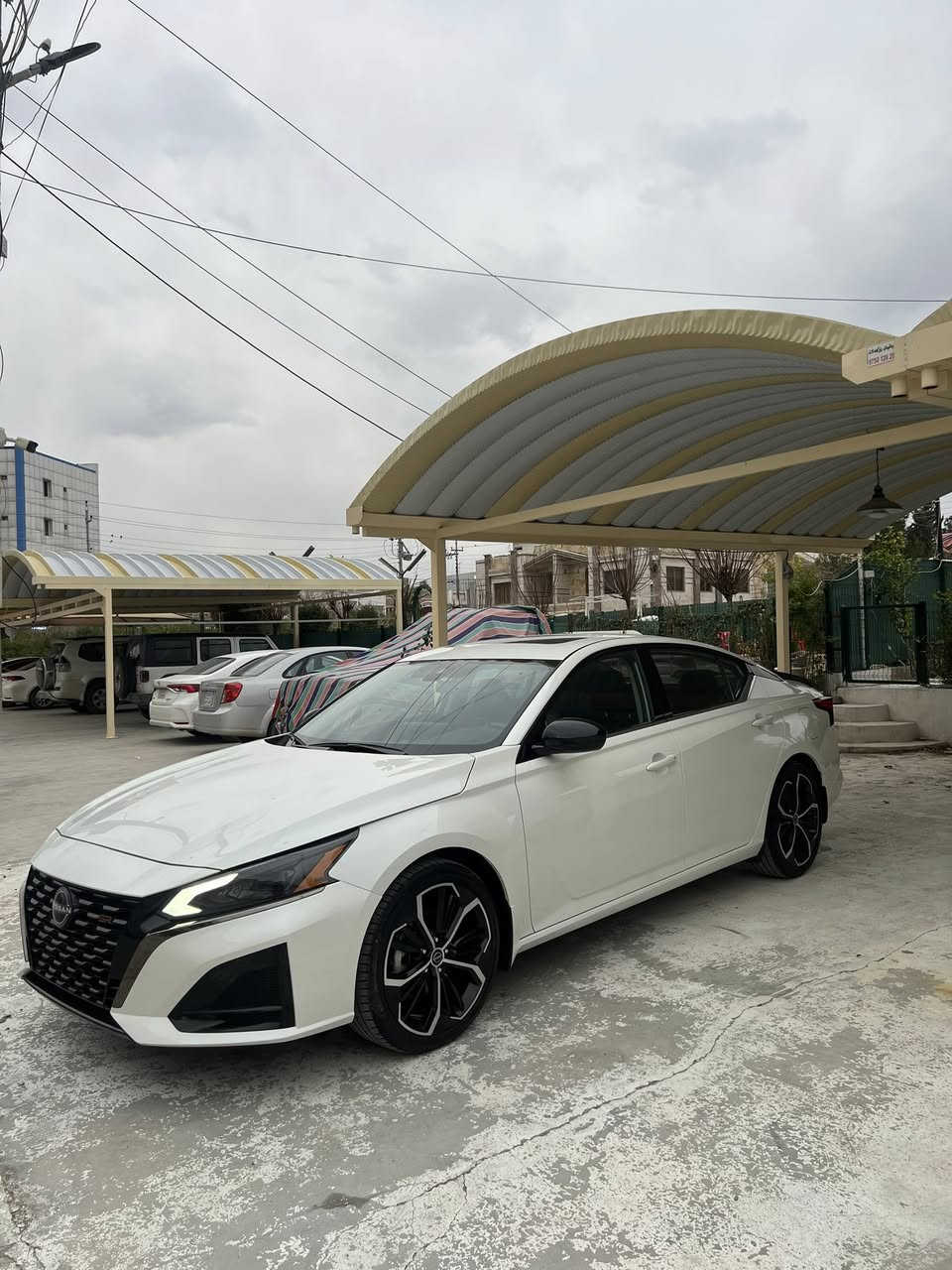 Nissan altima SR Pluss 2024 
كوردي-عربي

التما 2024 SR سلايد 
بي دبل اكسل بي توربو 
مكينة ٢.٥ لتير (مرغوب)
بصمة
شغال
سلايد
كوشين هيتر 
شاشة گةورة
كار پلةي
رادار پيش و پشت و تةنيشتةكان 
رادار خةتي جادة
كوشن كارةبا 
كوشن جلد 
جةمبةكي خةفيفي پشتي هةية
تةنها صندوق صبوغة (صندوق بلادي لةگةلة توزةكي دةبتة pdr)
پيش كةپس
ارباك هيجي نةتةقية هةمووي بلادي شةريكةية✅
١٨ هةزار  كيلومتر رويشتية

هةولير-هةفالان-نزيك مطعم باب الحارة
***********(واتس)
***********

عربي———///////

نيسان التيما SR Pluss 2024
‎تو ويل بدون توربو 
حجم مكينة ٢.٥ لتير(مرغوب)
مواصفات فول SR فتحة
بصمة 
شغال
رادار
فتحة
كشن كهرباي 
كشن جلد 
كشن تدفية
بي طغة بصيط من ورا 
قبغ جنطة صبغ (بلادي موجود شوي يصير pdr)
بدون ارباك كل ارباكات شركة
بجم كبس
ماشيء سيارة 
١٨ الف كيلومتر
مكان سيارة اربيل 
قريب عن مطعم باب الحارة 

*********** (واتس)
***********
