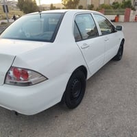 لانسر • ٢٠١١ • اوتوماتيك