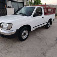 نيسان تاك 2000ناو سور سه يا ره كه سا غه كيرو مه كينه ئه كسل به شه رت ت...