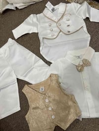 ملابس أطفال • ٣-٦ أشهر