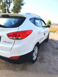 هونداي توكسون موديل 2013لون ابيض ثلجي تحكم ستيرن تبريد ثلج رقم اربيل ا...