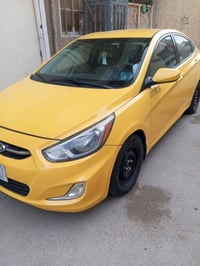 اكسنت مديل ٢٠١٥ حادث بس دعاميه خلفيه فقط وارد امريكي  السياره حلوه رقم...