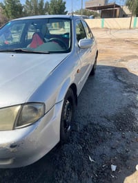 مازدا 323 • موديل ٩٩ • رشة صبغ