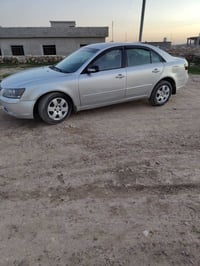 عندي هوندا سوناتا للبيع موديل 2009 صبغ عام جماليه  بيها مكانات معجون ك...