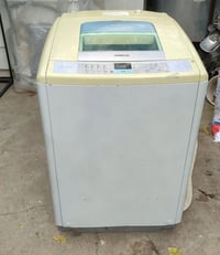 غسالة هيتاشي • باب علوي • ١٢كيلو