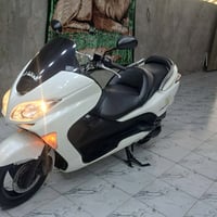 دراجة فور • نضيفة • محرك بكفالة