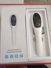 مشط علاج ضوئي • جديد بالكارتون • سوق الشيوخ