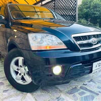 سورنتو موديل 2009 لون حبري مميز استخدام شخصي نظيفه جدا بيه طخه بالجامل...