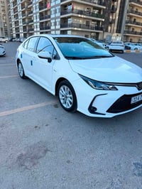 كورلا هايبرد 2025 للبيع فول عدا كشن كهرباء مكفوله جديده جدا مواصفاتها ...