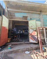 الفلوجة قرب الجامع • قاعة تجارية ٢٠٠م • وارد شهري ٥٠٠ الف