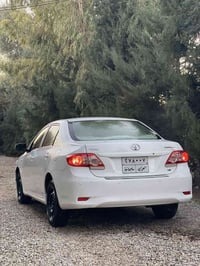 سەرەتا بەناوی خوا تۆیۆتا کرۆلا  مۆدیل 2013 مەکینە بچووک سپی بەفری  یەک...