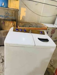 غسالة • مجمدة • باب المشهد