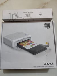 طابعة صور • CP4000L • محمولة