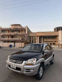 سبورتج 2008 موصفات عادية  مصبوغة حزام  جمالية بدون دواخل  السيارة جاهز...