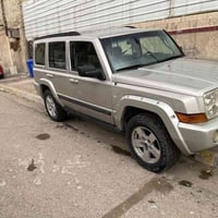 جيب كومندر 2007 لون ذهبي محرك 4700رقم بغداد سعر 83وبيه مجال 0770517651...