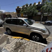 لاند كروز برادو 2008 لون ذهبي . فور ويل مع لو گير . تحكم مري. كامرة خل...