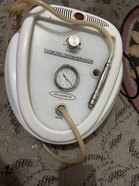 جهاز تنظيف بشرة • جديد • معطل