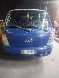 عندي  كيا بنكو 2007 دبل قمارة  رقم بغداد مكفولة من الصبغ والضربة تبريد...