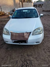 سيارة اوبتره مديل 2011 سياره مصبوغه حزام اثر شخوط وتبديل الچملغ المامي...