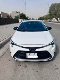 كورلا 2024 هايبرد   ماشية 26 الف   المواصفات فول وكشنات جلد وكهرباء  م...