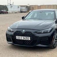 BMW 430i موديل 2024 ماشية 39 الف ميل سنوية جديدة ب اسمي رقم بغداد كير ...
