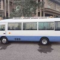 كوستر للبيع مواليد 2005 سياره مصفر بسمي رقم النكليزي طالع بعد بس استلم...