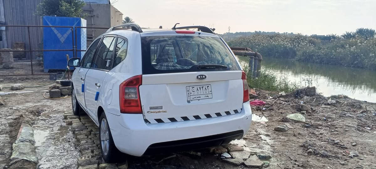 كيا كارنزه     2009 خليجي رقم بغداد مكفوله من الصبغ فقط بارد الداير جاملغ الخلفي   ***********
