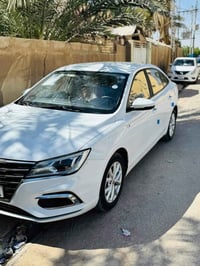 Mg5 2023 بأسمي رقم بغداد ماشية 24الف سيارة فئة كومفورت نص فول بصمة كام...