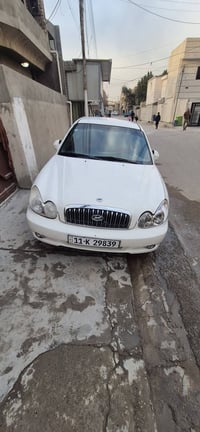 سوناته وفود 2001 كير عادي رقم بغداد نكليزي سنويه وهزه جديده سياره كامل...