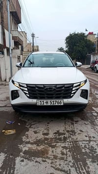 توسان 22 وارد خليجي/اللون ابيض/رقم بغداد / محرك2000/ جديدة ماشيه 39 ال...