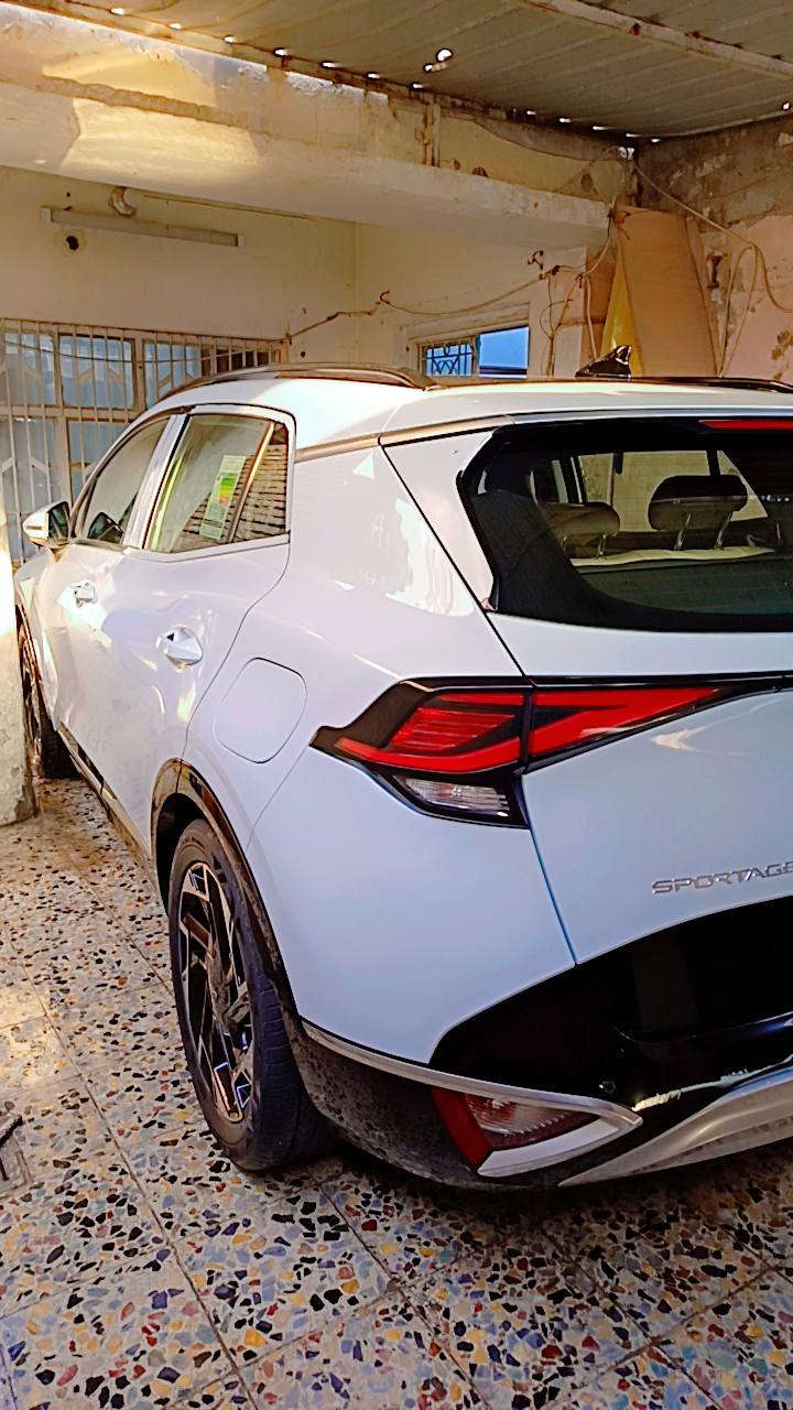 السلام عليكم
كيا سبورتج ٢٠٢٣  خليجي كوري اصلي 
سياره جديده بحاله الوكاله والضمان 
ماشيه 33 الف كيلو حقيقي رقم بغداد انكليزي الجديد  بأسمي 
* بانوراما 
* داخل بيجي
* سعة المحرك 2.0L
* ويل كب ١٩
* تشغيل عن بعد
* حساسات أمامية + خلفية
* شحن واير ليس
* هاند بريك بصمه
 * بصمه عدد ٢
* مري شفط + اشارة
* منافذ شحن للمقاعد
* تبريد بيانو قطعتين (منفصل)
* كراسي كهرباء+تدفئه كشنات + تدفئه استيرن  
* لد ترحيب
* اوتو هولد
* شاشه كبيره
* نضام نزول منحدرات
* مانع انزلاق
* تحكمات ستيرن
 * كامره خلفيه دواره 
* ماسحه خلفيه
* بصمة دخول 
* حساس مطر
* لايت لد زنون LED
* بك لايت زنون LED
* بروجكتر لد
* اوضاع قياده 
* مخرج منفذ طاقه 
* بلوتوث
* مرايا داخليه تعتيم
* مثبت السرعة Cruise
* المودات والأوامر الصوتية
* أوضاع القيادة  Drive Mode
* فحص أنظمة السيارة 
* الارضية مغلفة بجلد لون بيجي 
* سبير ما نازل 
السيارة مكفولة من محرك و گير و الحادث و الصبغ والبارد والتكحيل  
* السعر 232 وبيها مجال حك الجيه 
* مكان السياره بغداد الشعب حي اور 
* استفسار اكثر ***********
