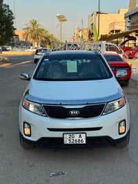 سورنتو 2014 خليجي 7 راكب بيها قطعتين سونار مرفق بل منشور فول مواصفات 1...