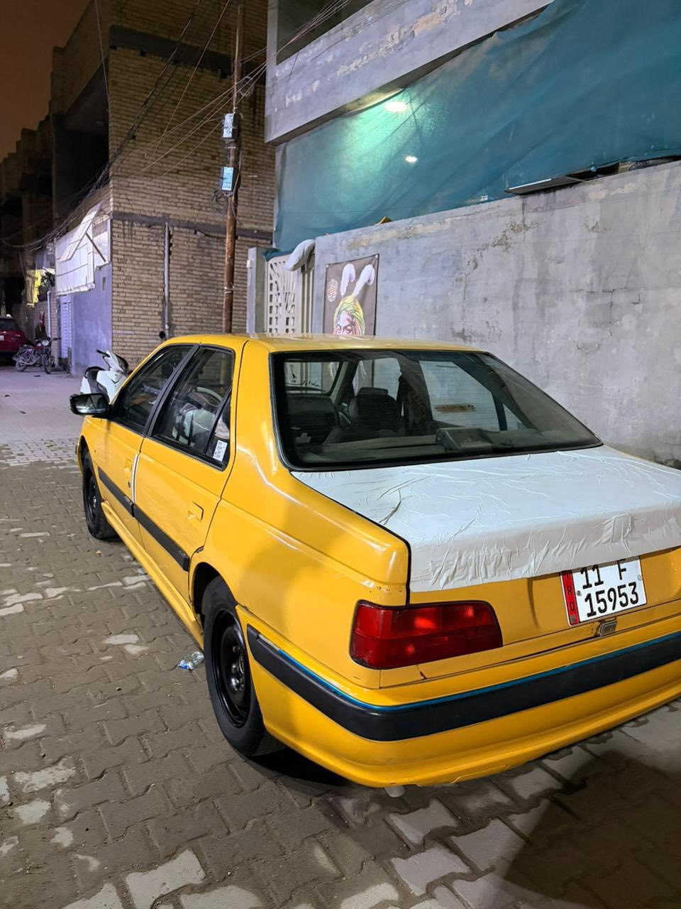 بيجو بارص 15.  السيارة نضيفة شوفة عينكم تجي تفحص وتشوف التبريد خير من الله وتبريد البارص معروف ثلاجة السيارة مال بيت وعليهة ادامة كاملة بيهة ضربة بلجاملغ الخلفي ومرجعيهة   وبيهة الجاملغ الامامي بجهت السايق مبدل  مكاني بغداد الشعلة ***********

