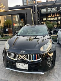 سبورتج EX 2017 رقم بغداد محرك 2.4 ضربتها خفيفه فقط جاملغ  وبالعراق قطع...