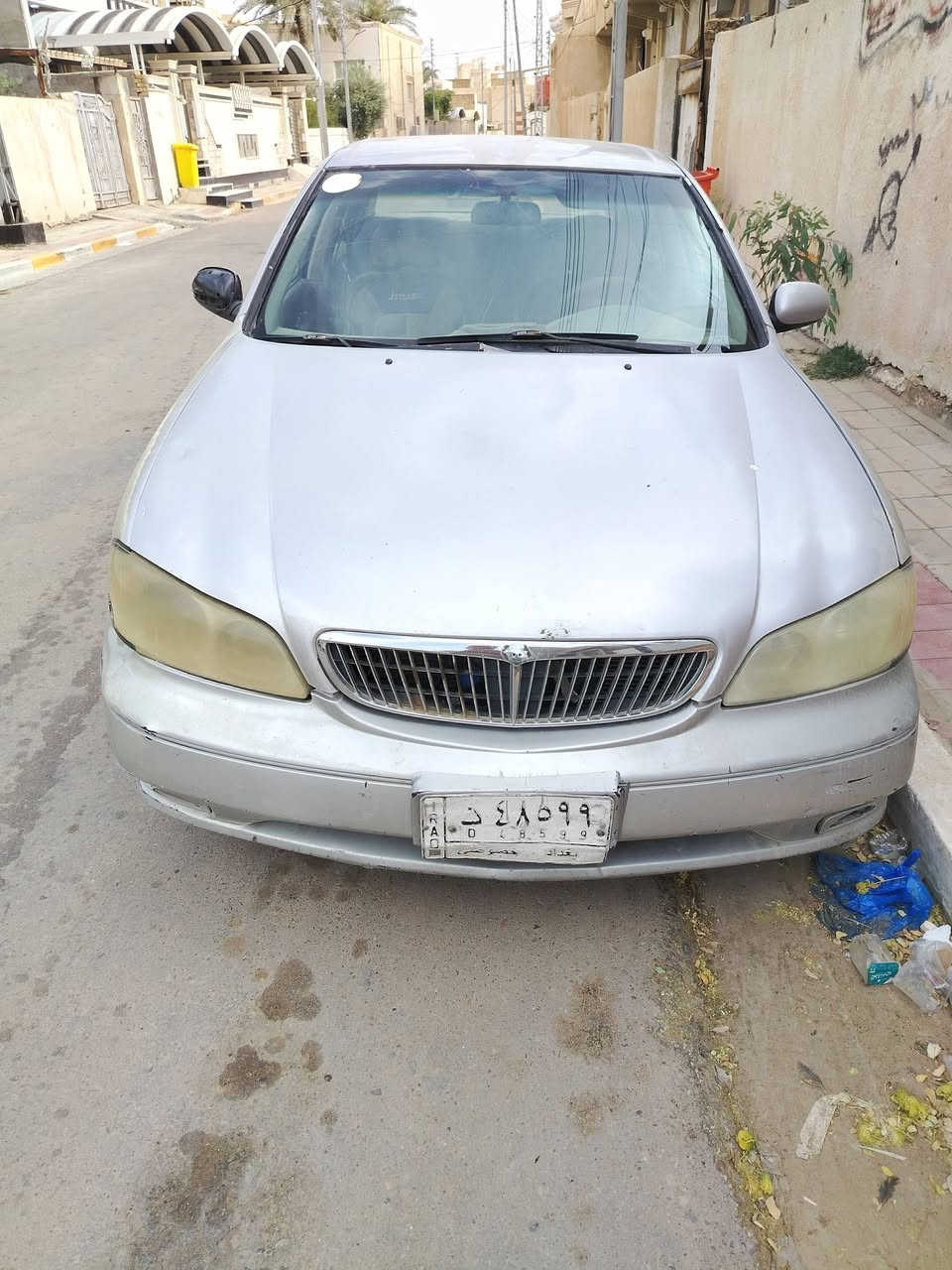 سلام عليكم نيسان مكزما ٢٠٠٢ رقم بغداد بأسمي سعرها مناسب مكان السياره بالعماره عواشه الشراي يتصل *********** مكينتها بيها دخان
