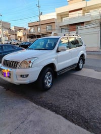 برادو ٢٠٠٩ • ابيض ثلجي • ايرباج مفجور