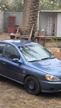 كيا ريو  موديل 2000 هزه جديدة سنويه بسمي ل2030 مشروع وطني رقم بغداد بي...