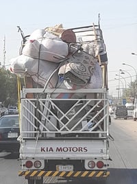 نقل أثاث • داخل وخارج بغداد • كيا بنجو