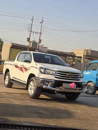 للبيع فقط هايلوكس 2018 فورويل اوتماتيك شركة ساز  رقم بغداد انكليزي سنو...