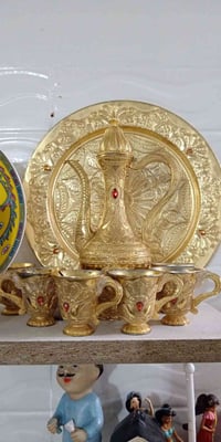 تخم جمالايا صينيا و  قوري و عدد ٦ فنجان ب ١٥ الف مو نحاس فقد لون كولد ...