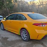 كورلا هايبرد 2024 عداد السياره 9000ml السياره مرقمه بغداد وجاهزه باسمي...