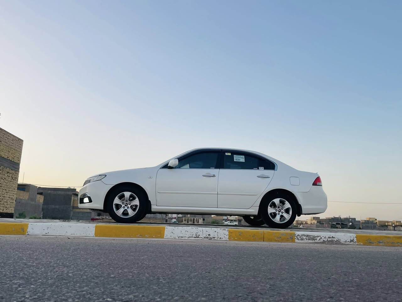 كيا اوبتما 2009خليجي بيهه قطعتين  الجاملغ الخلفي والباب الخلفي   رش  بدون دواخل مكينه 2000دوش رقم نجف مشروع وطني مكينه كير حداديه تخم تاير تبريد تدفئه كله جديد السياره جاهزه مال جناي مكان السياره بابل السعر 112وبيهه مجال ***********
