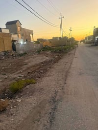قطعة ارض ٣٥٠م ركن شارع حله بغداد للايجار للاستفسار ٠٧٨٠٠٠٥٦٥٦٩