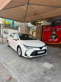 كورلا هايبرد 2025 رقم بغداد ماشيه 5000 الف كفاله عامه  فول السياره معر...