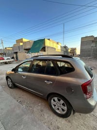 كيا رندو 2009 بغداد وارد أمريكي حادث جاملغ الخلفي الأيسر سبعة راكب محر...