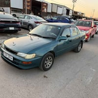 كورلا موديل ٩٤ محور للبيع  رقم بغداد جديد  هزة وفحص جديد  السيارة بأسم...