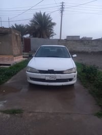 بيجو ٣٠٦ • ساقطة ٢٠٢١ • رقم بغداد