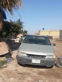 بيجو 2009للبيع محور كير محرك ونجي 07808894582