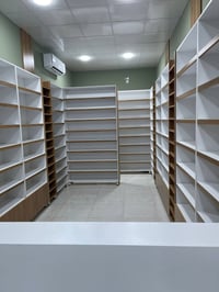 اثاث صيدلية • رفوف • كربلاء التعاون