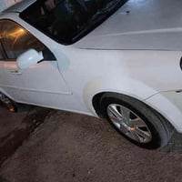 سيارة أوبترا مديل 2011 الشركة العامة للبيع بيها حادث باب وجاملغ خلفي ع...